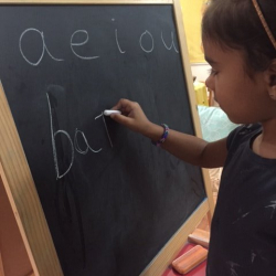 Lila spelling out words.