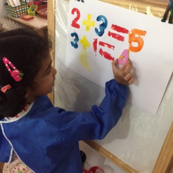 Manya playing around with numbers and addition.