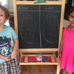 Wilbur and Lila draw Easter Eggs.