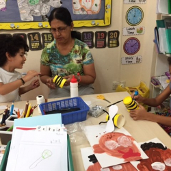 Arya & Manya making bees.