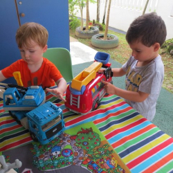 August and Enzo playing with trucks