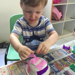 August working on his jellyfish craft.
