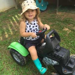 Katie having fun on the tractor!