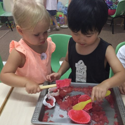 Samuel and Ella exploring sensorial play with jelly