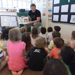 Iggy's Dad enthralls the children as the mystery reader!