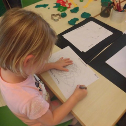 Ottilie drawing her favourite food - dumplings!
