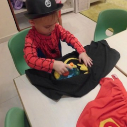 Spiderman (Frederik) helping Batman do his ironing!