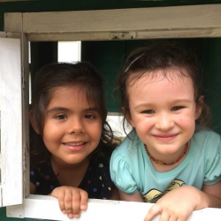 Ana & Emily having fun in the playhouse.