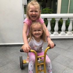 Ottilie & Phoebe having fun on the bikes.