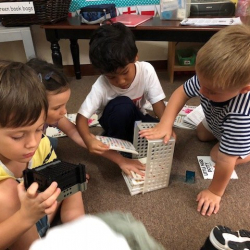 Working together to put the books away.