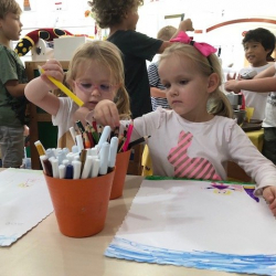 Zoe & Phoebe drawing a picture.