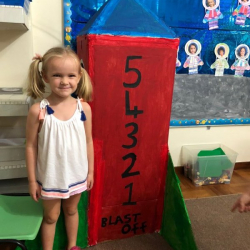 Phoebe makes numbers for the count down to blast off.