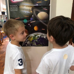 William & Frederik talking about planets.