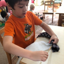 William making his tie snake.