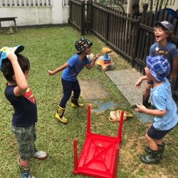Boys having fun in the garden.