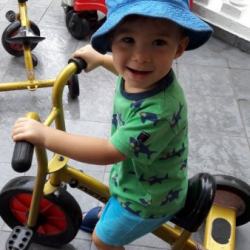 Benjamin enjoying bike time!