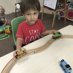 Felix playing with the train set!