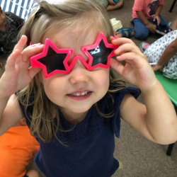 India with her pretty pink star glasses for show and tell!