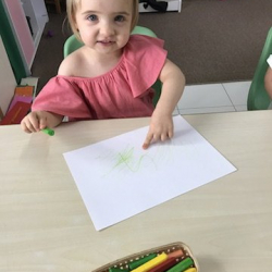 Madeline enjoying some creative drawing!