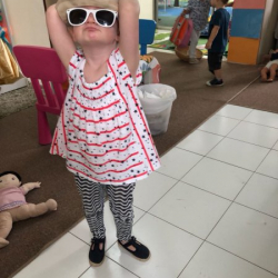 Elodie with her show and tell hat and sunglasses!
