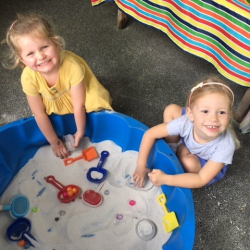 Claudia and Sophie T. had fun digging in the sand box.
