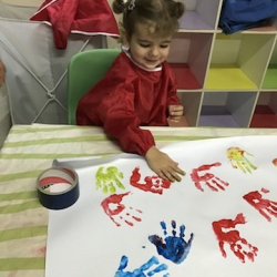 Working on our handprint craft.