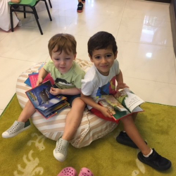 August and Enzo checking out some good books together!