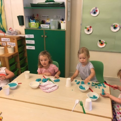 Claudia, Matilda, Sophie T.and Sophie M.A. having fun with our new blue play dough!