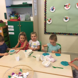 Johnny, Bella, Claudia, Matilda and Sophie T. practice good cutting and scooping with play dough.
