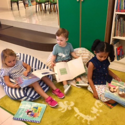 Katie, August, and Avyanna checking out some good books!