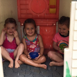 Sophie M.A, Bella, Claudia discovered that is %22rained%22 hose water inside the play house!