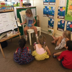 “Teacher Bella” with her attentive students!