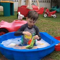 Charlie explored the water wheel during Splash Time.