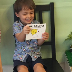 Felix, very excited to share his Mr Bounce book!