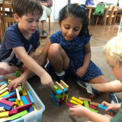 Daniel, Otto & Avyanna worked together to build a tower.