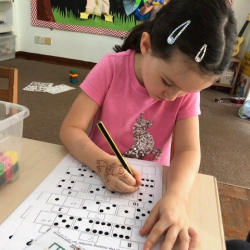 Emily working on some number work.