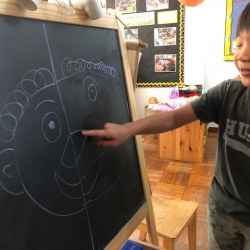 Isaac worked on his symmetry and got the giggles.