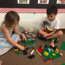 Katie & Isaac build Lego together.
