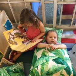 Coco enjoyed listening to India read to her!
