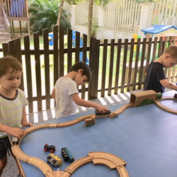 Felix H, Noah, Felix M played well together with the train track.