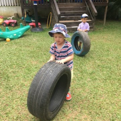 Felix M and Lorenzo has to use their muscles to lift and roll the tires!