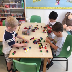 James, Samuel, and Felix H. had fun with the linking cubes.