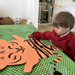 Rupert helping to paint our Tiger for our display board!