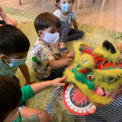 Learning about lion dance during Mandarin class
