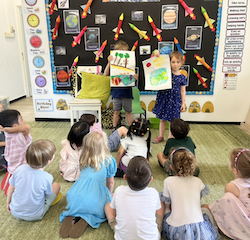 George and Olive excitedly sharing about their poster that they did together over the weekend.