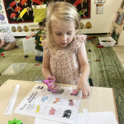 Regan enjoying her jolly phonics activity.