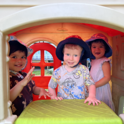 Smiling from the little play house in the garden!