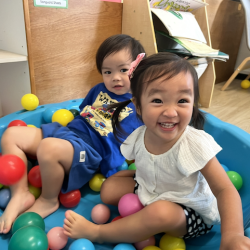 Alli and Avery enjoying the shell ball pit!