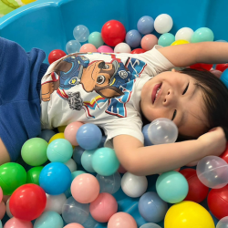 Avery enjoying the ball pit!