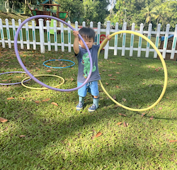 Charlie playing with the hoops!